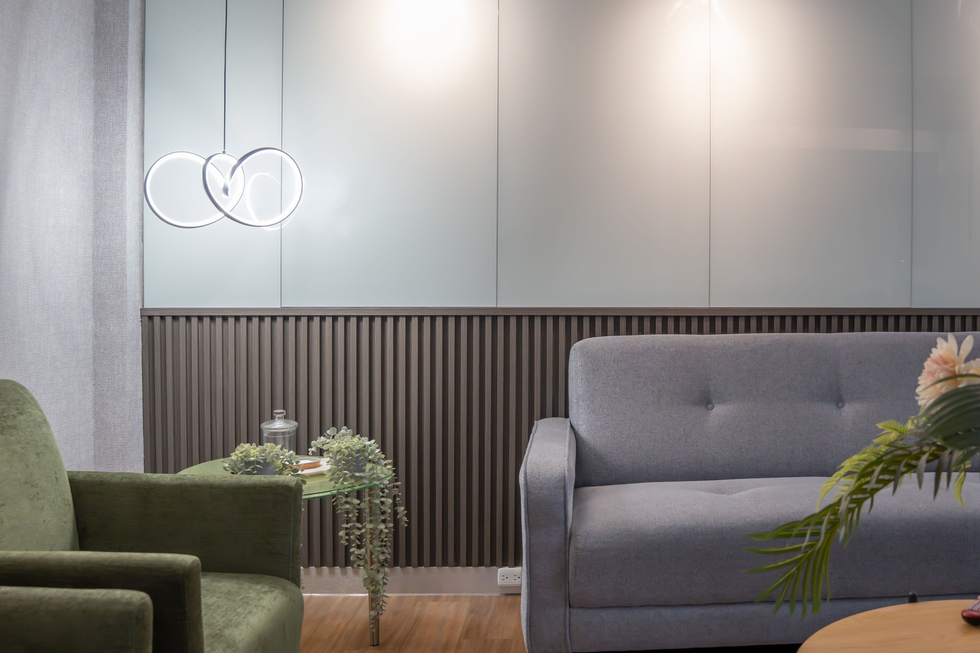 Modern Waiting Room with Sofa, Armchairs, and Contemporary Decor. tv and more
